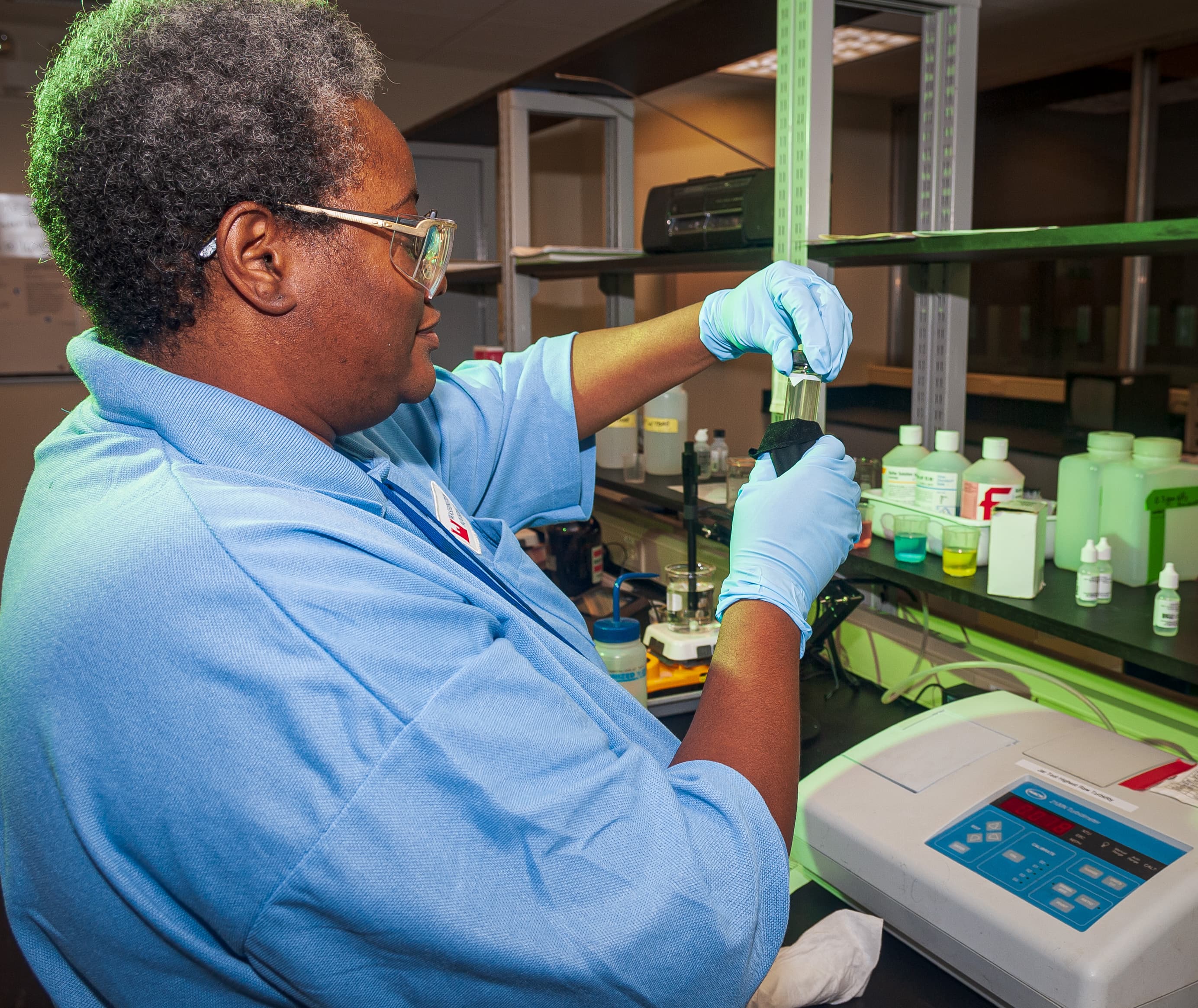 Laboratory technician testing water samples