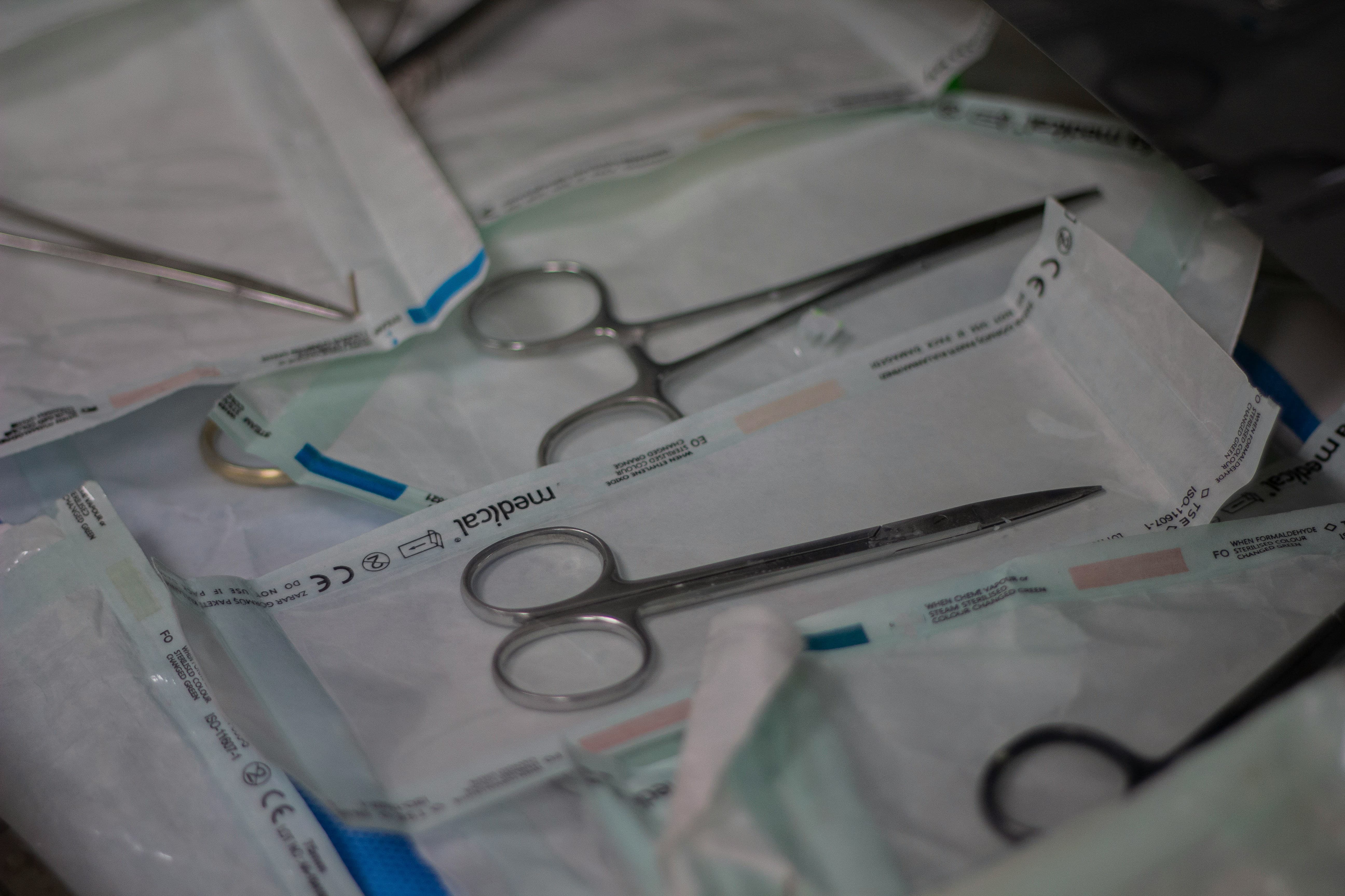 Sterilized surgical instruments in sealed packaging marked for ethylene oxide sterilization